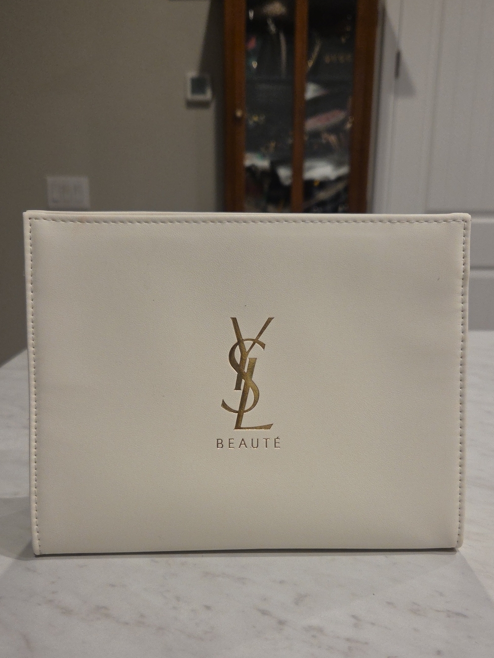 Yves Saint Laurent White Cosmetic Pouch with Gold Logo